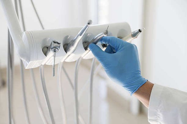 Professional Tooth Extraction technician working in Carolina Beach, NC